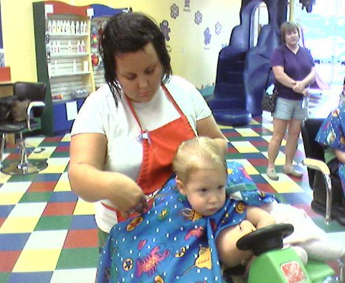 ashton's first haircut